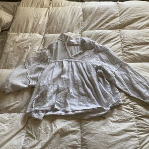 White oversized distressed blouse